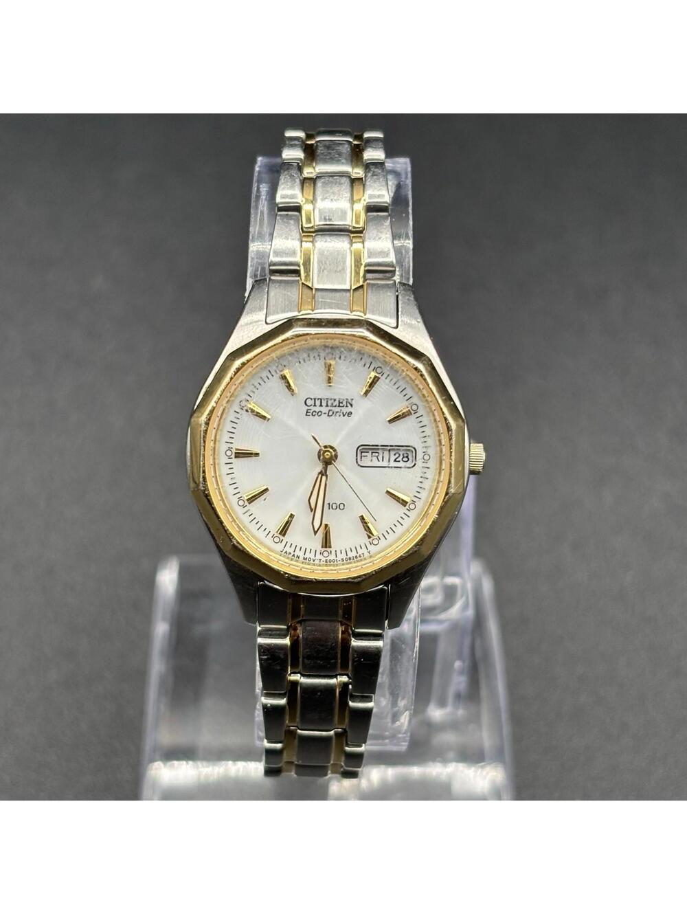 Citizen Eco-Drive Ladies Two-Tone White Dial Watch Geometric Bezel Day/Date Runs